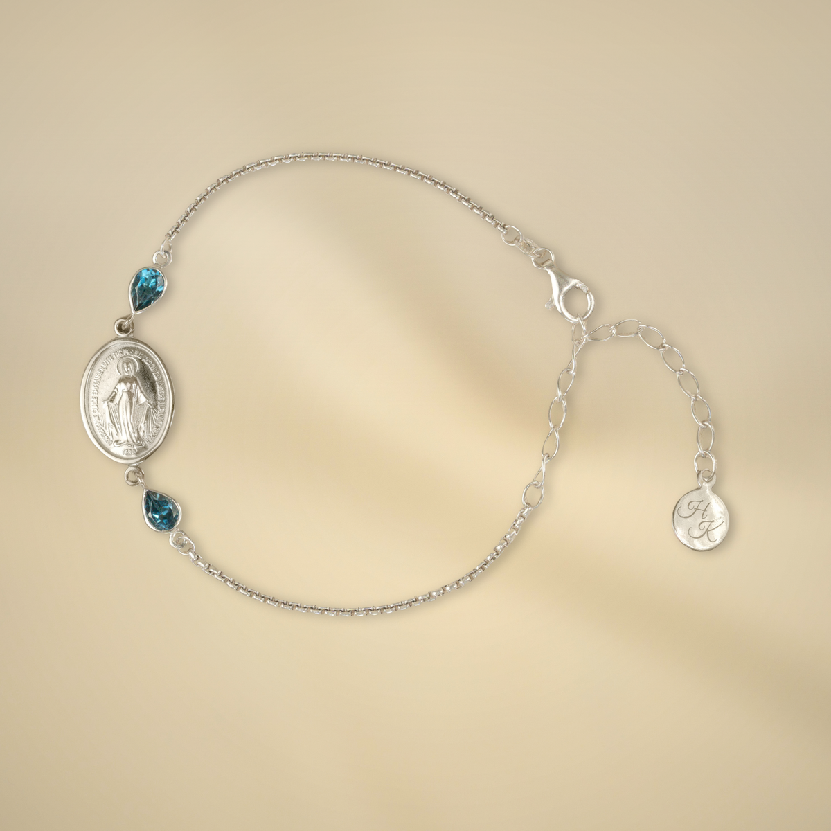 Pulsera de plata con 2 topacios London Blue