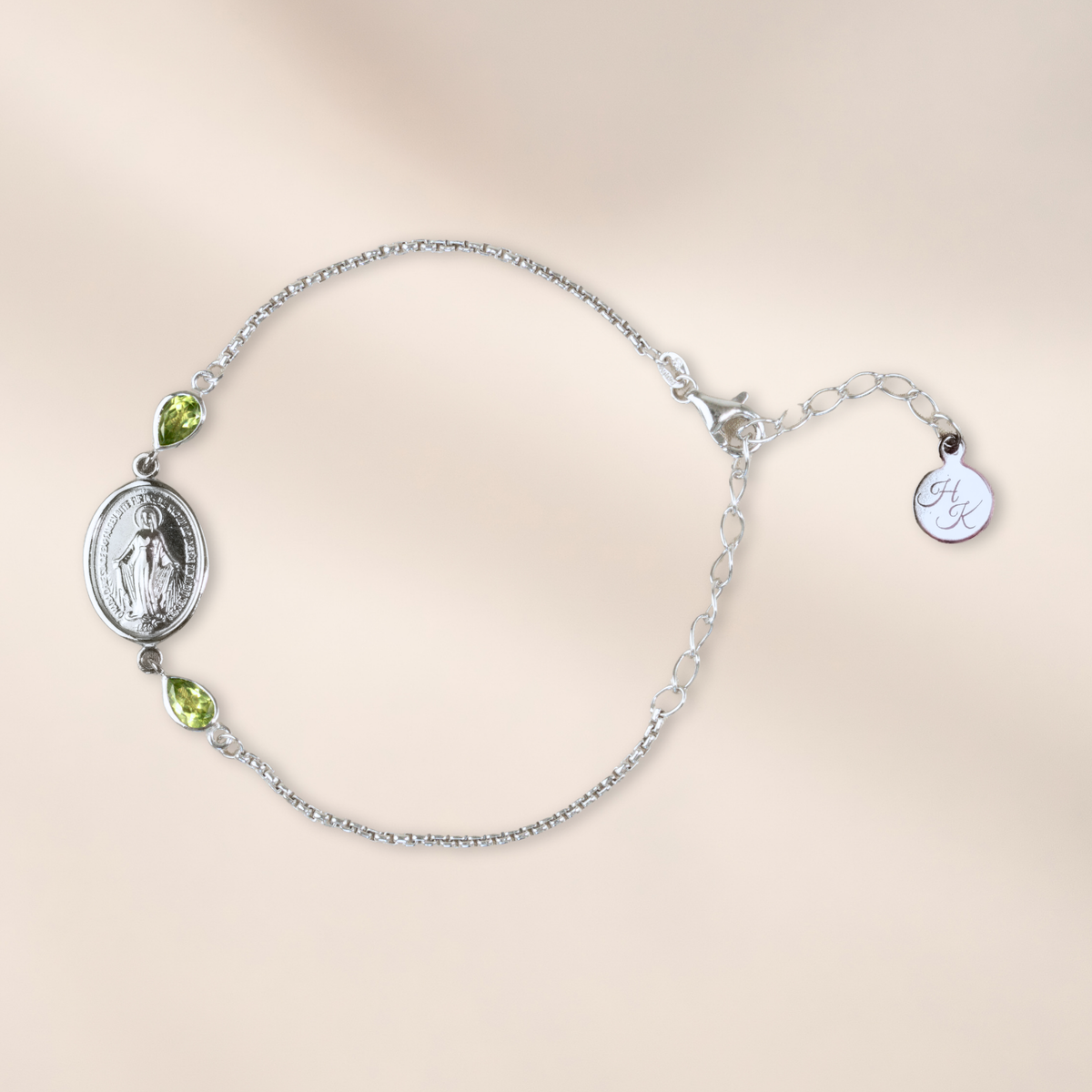 Pulsera de plata con 2 peridotos de 6 x 4 mm cada uno